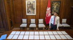 Rishi Sunak with paper laid out on a desk as he prepares for the spring statement.