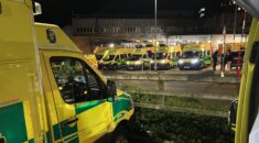 Ambulances queuing outside a hospital at nighttime on 15th May 2022