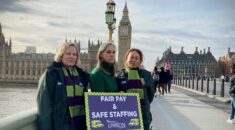 Activists stand on Westminster bridge raising awareness of the ambulance dispute.