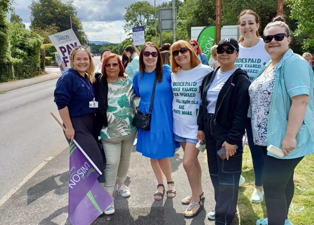 UNISON members gather on the picket line in Plymouth.
