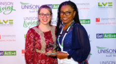 Waetsi collecting her Get Active award, presented by TUC regional secretary Ines Lage.