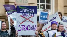 Bath and North East Somerset Council workers protesting in Bath. They're holding placards.